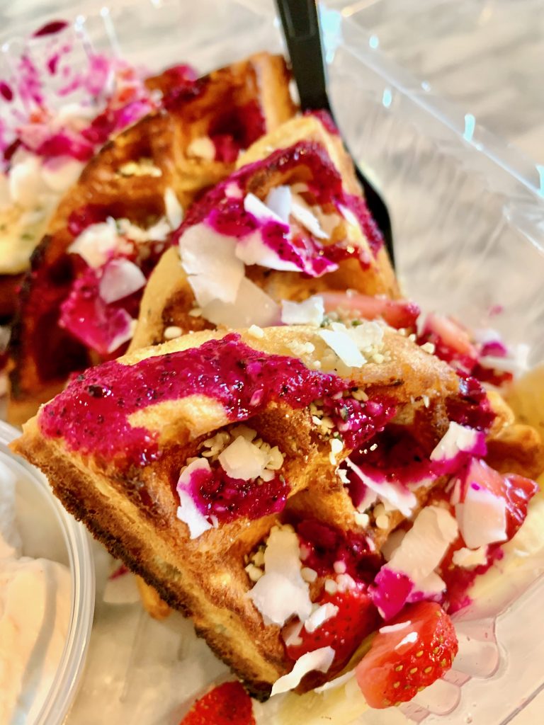 waffle with pitaya sauce and coconut from Kaleidoscope, one of the 10 best restaurants in Scottsdale Arizona